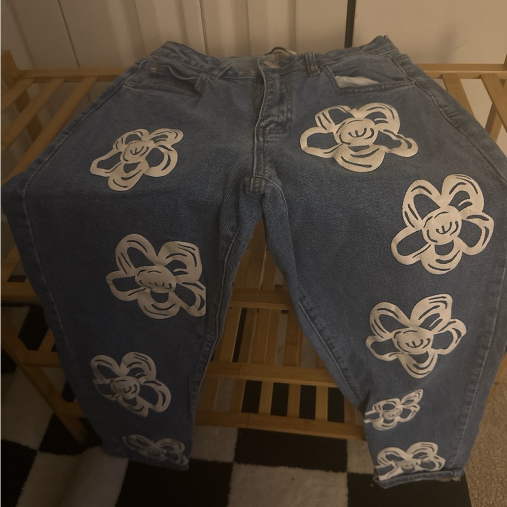 Rue21 Blue Jeans with White Floral Patterns
